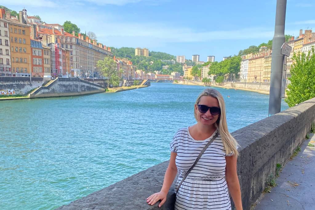 Is Lyon Worth Visiting? This is a photo of Eleanor along the river in Lyon, France